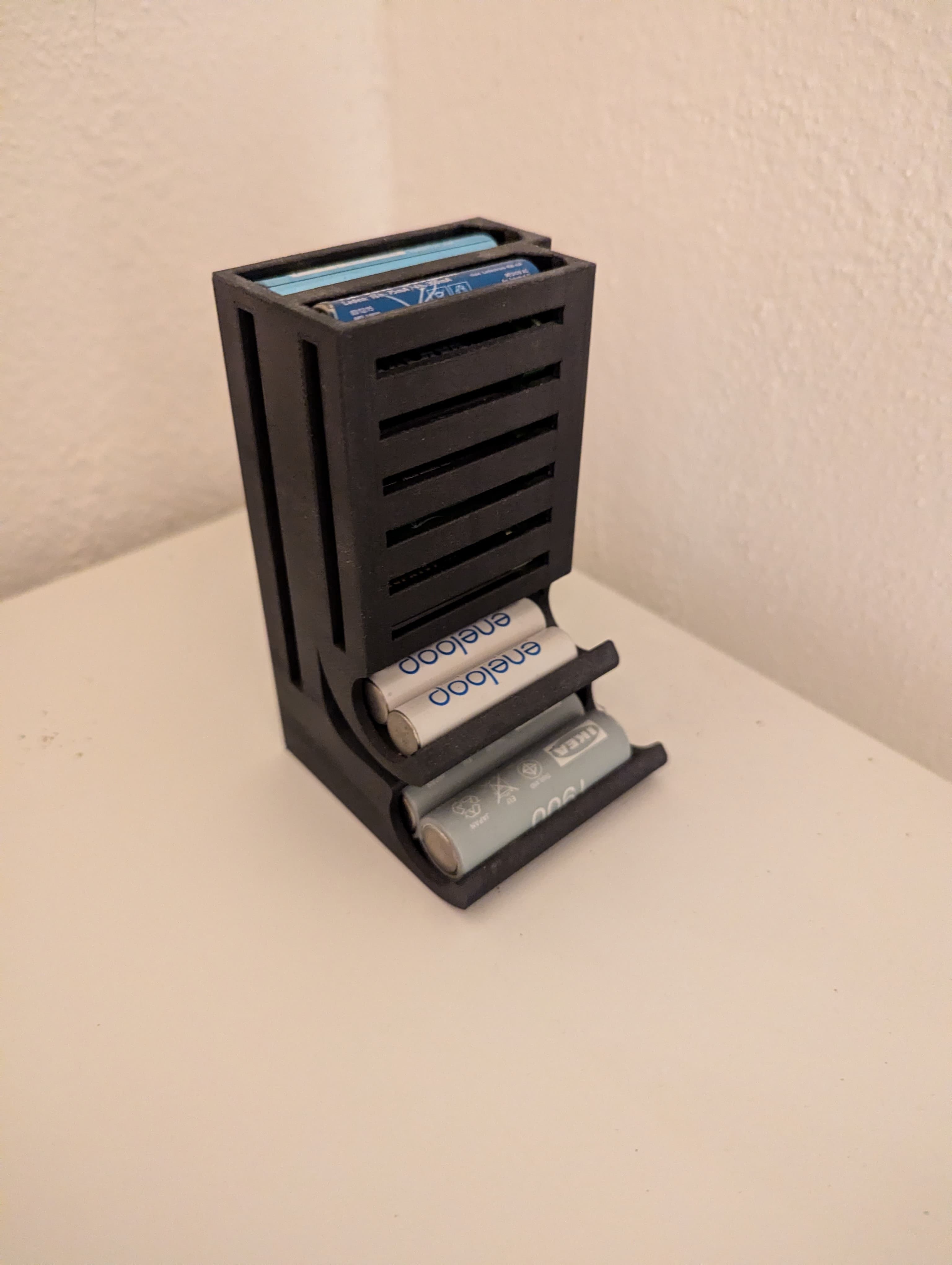 Диспенсер батареек AA и AAA