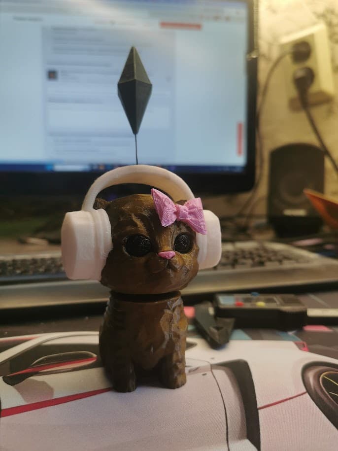 Танцующий кот из Sims в наушниках — бобблхед